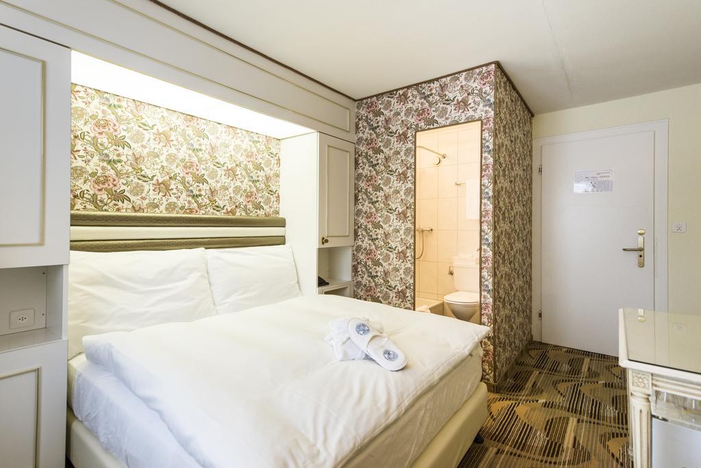 Posthotel Holiday Villa Arosa Chambre photo